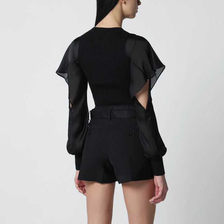 Sacai - Black knit top with semi-sheer sleeves