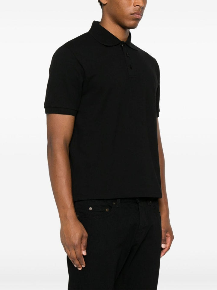 Saint Laurent Topwear Saint Laurent T-shirts and Polos Black Saint Laurent Black Cassandre Logo Piqué Polo Shirt at Italian Luxury Group Brand